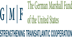 Lime green letters spelling The German Marshall Fund of the United States and blue letters spelling G|M|F Strengthening Transatlantic Cooperation
